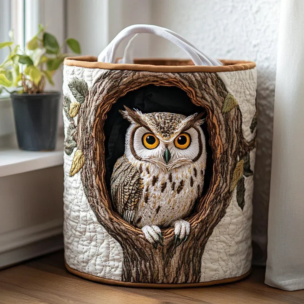 Padded basket with owl among branches
